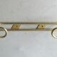 Set of 3 coat hangers in gold metal, 60s