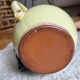 Earthenware jug/carafe HB with grape bunch slip decoration.