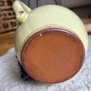 Earthenware jug/carafe HB with grape bunch slip decoration.