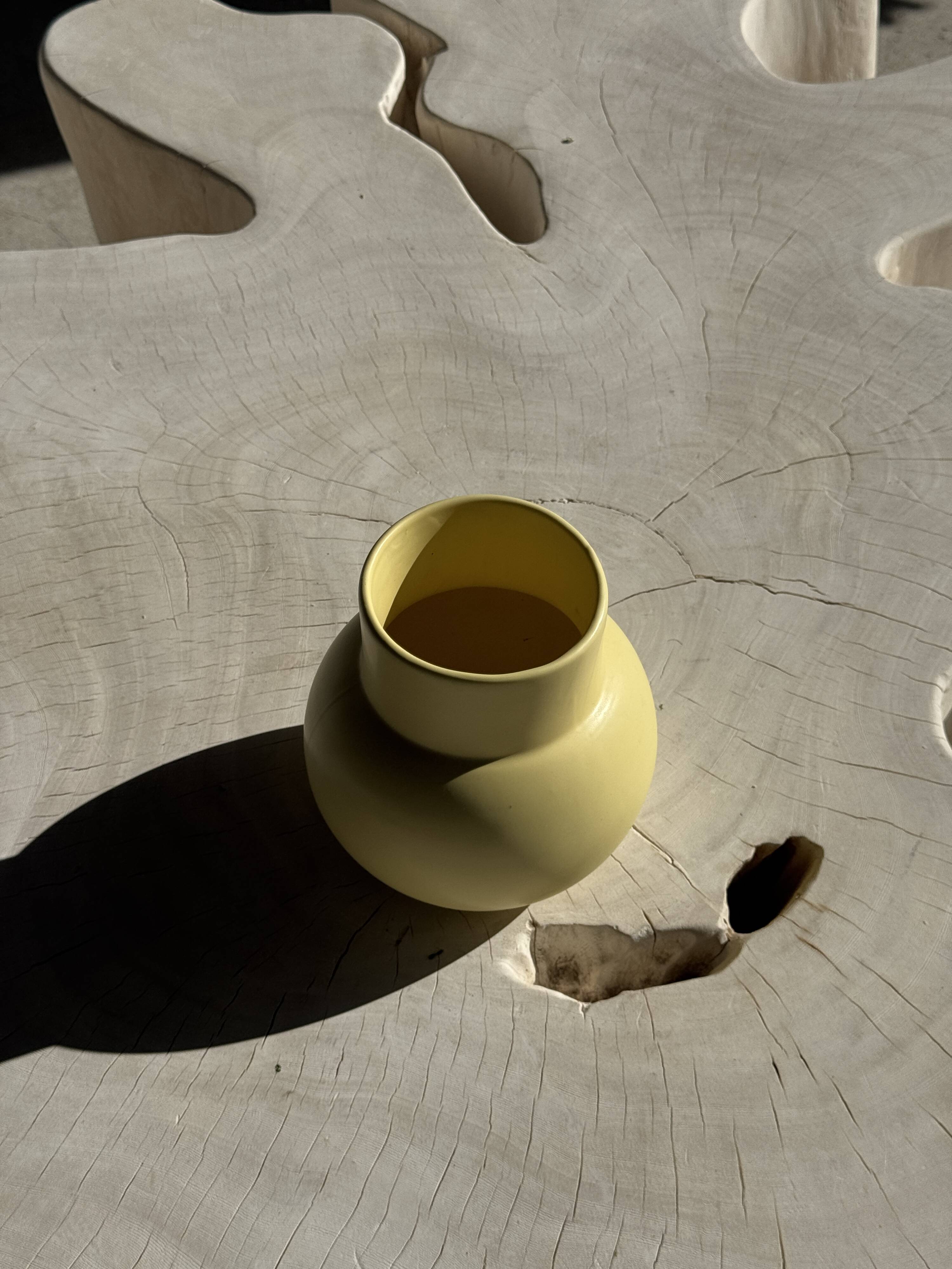 Small light yellow ball vase