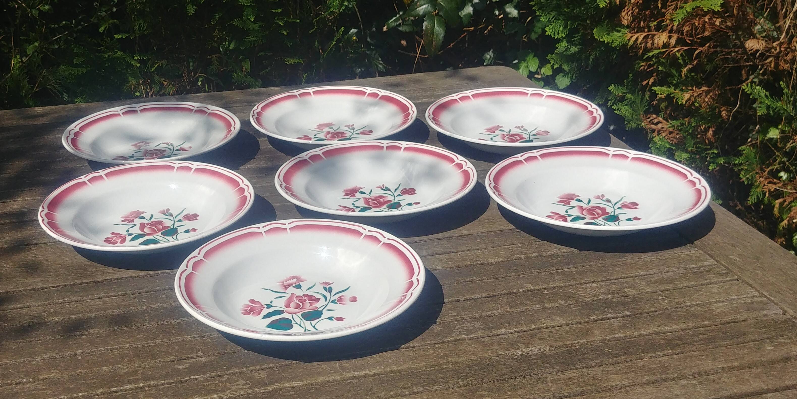 Lot of seven old soup plates from the 40s/50s decorated with roses
