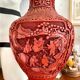 Asian metal vase and red resin