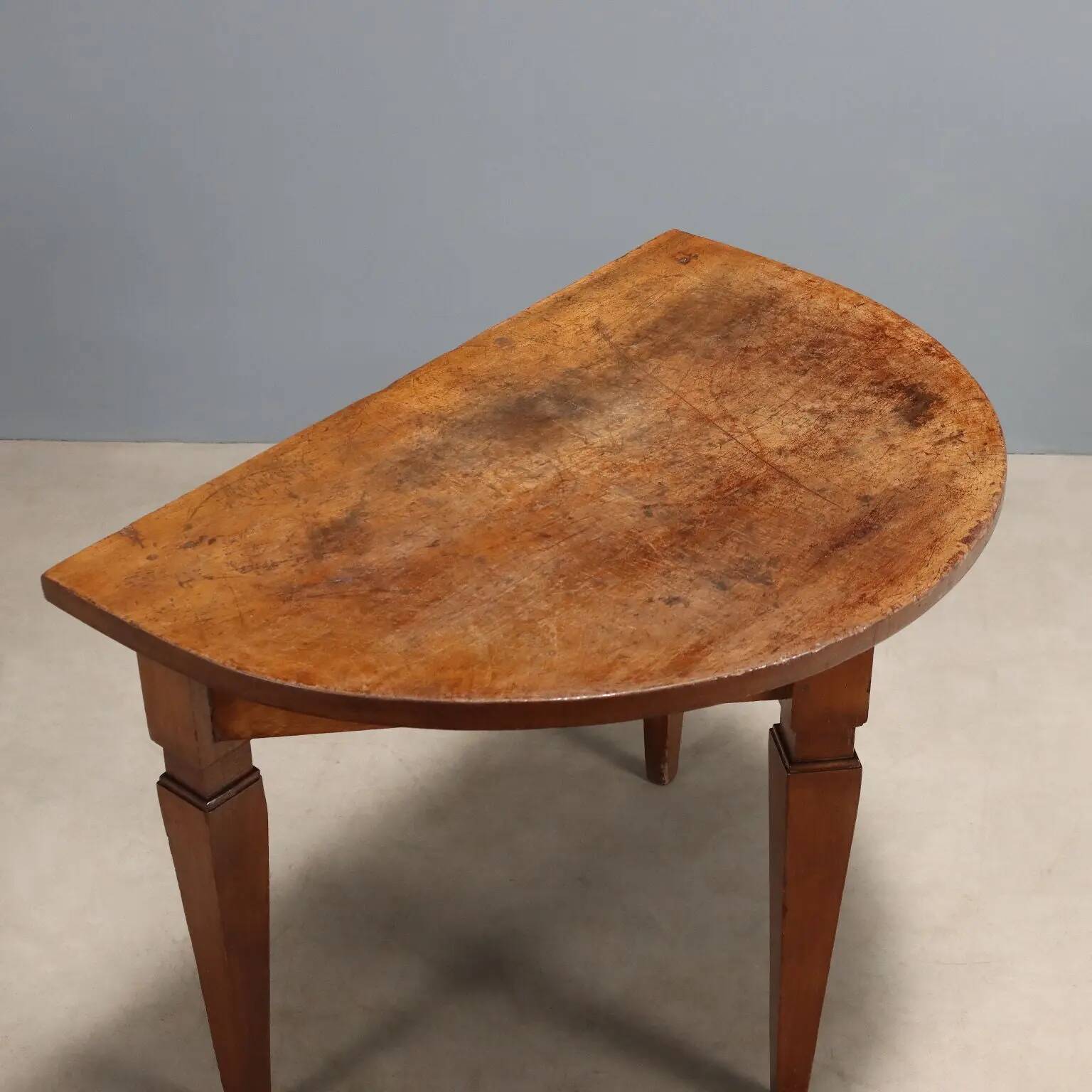 Antique Directoire console with a half-moon top, Italy, 19th century.