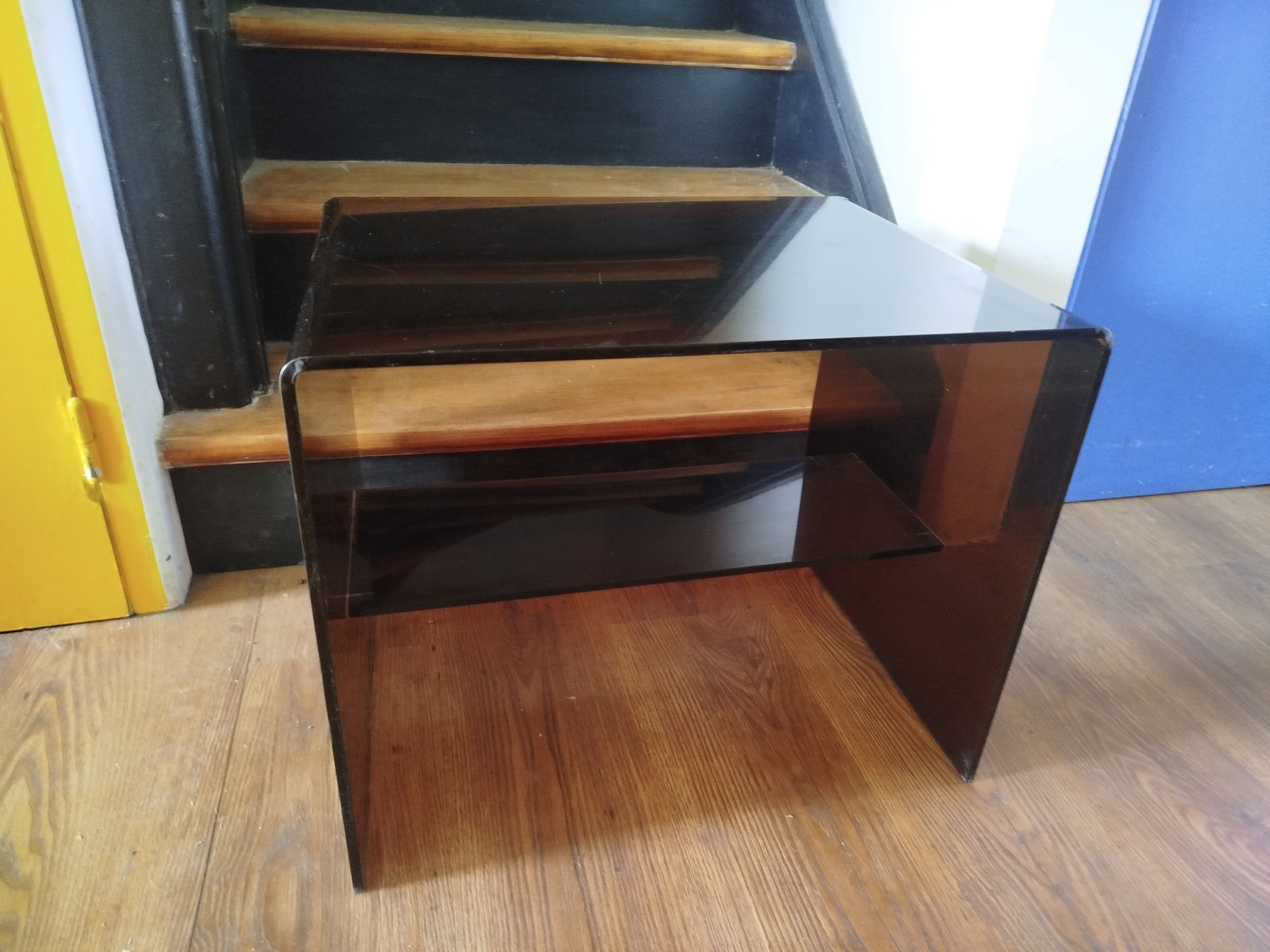 Coffee table / accent piece by Michel Dumas in smoked plexiglass – year