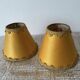 Pair of small old orange lampshades with trimmings