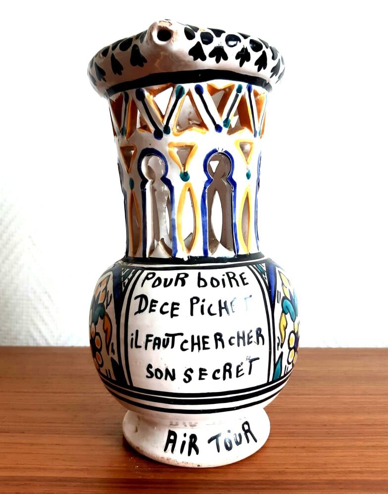 Deceptive pitcher in glazed earthenware