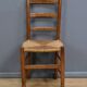 Set of 4 rush-seated chairs in cherry wood – late 19th century
