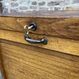 Sliding curtain binder cabinet