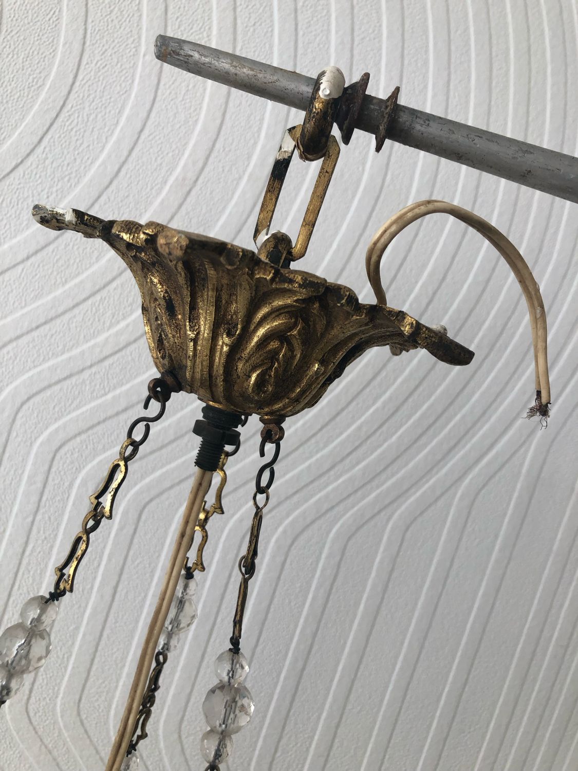 Vintage tassel chandelier has 2 glass and brass crowns