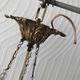 Vintage tassel chandelier has 2 glass and brass crowns