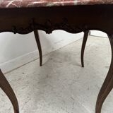 Louis XV mid-table in oak and marble, 18th century.