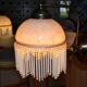 Opaline wall light with ceramic and glass pendants