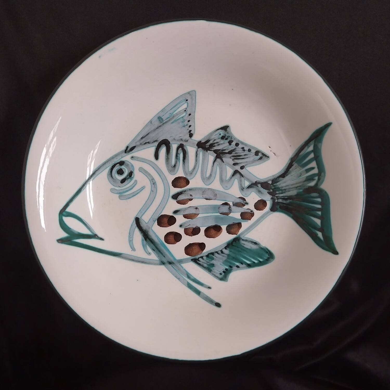Assiette creuse à décor de poisson R.Picault
