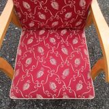 Scandinavian armchair in wood and red fabric