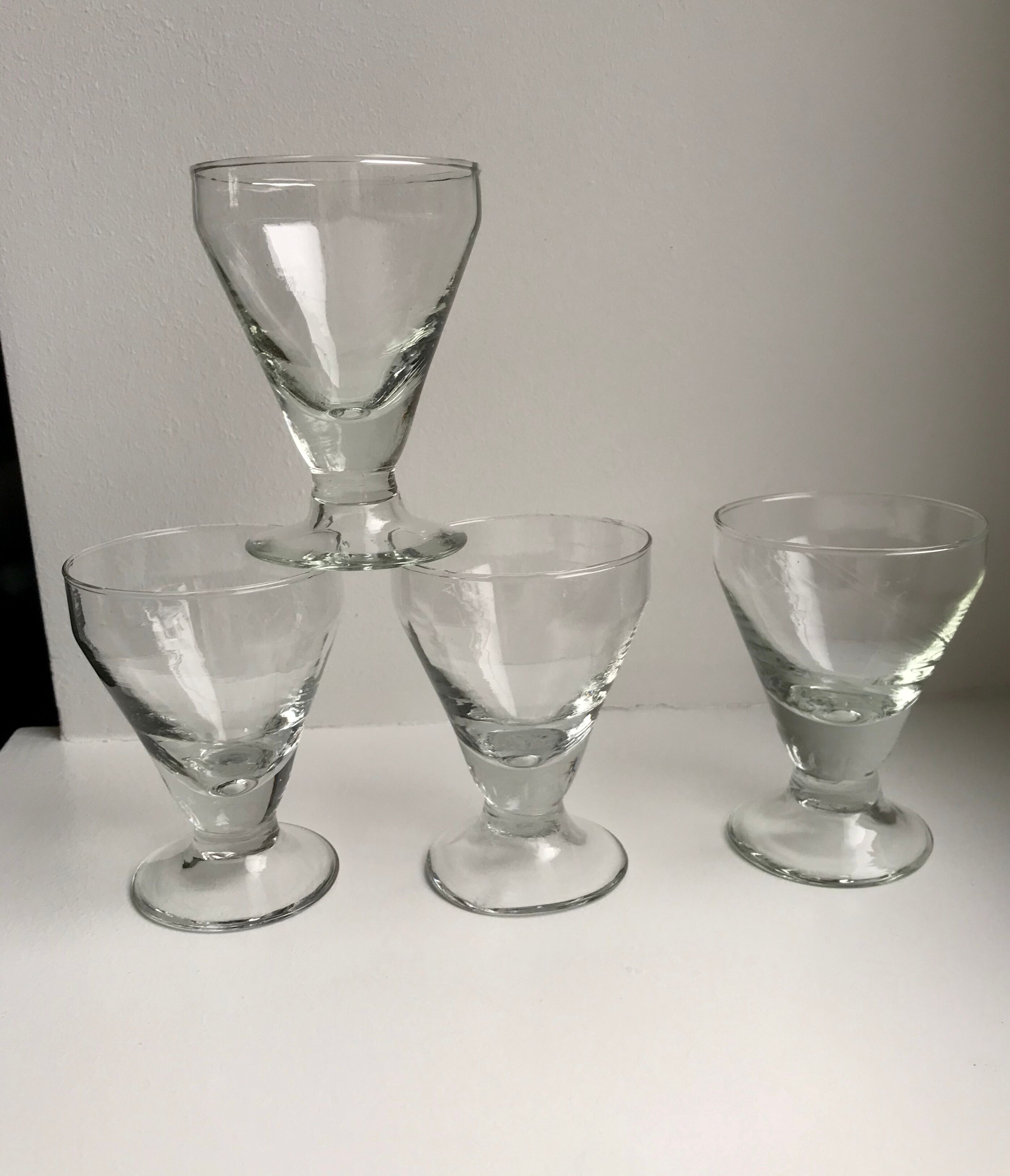 set of 5 glasses with thick bottom feet early twentieth century