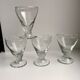 set of 5 glasses with thick bottom feet early twentieth century
