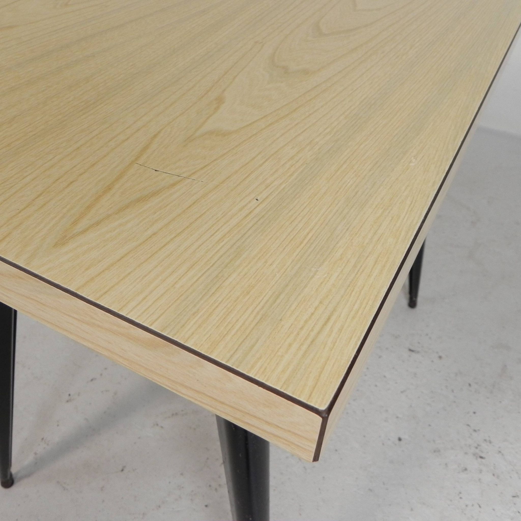 Bistro table Henri Julien, model Tolix T55 with a Formica top, 1950s.