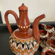 Vintage liqueur service in glazed terracotta