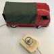 Red Renault estafette guided by a wire