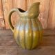 Old ceramic jug in the shape of a gourd by Louis Lourioux