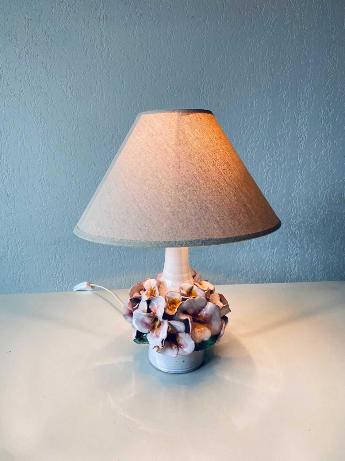 Terracotta lamp flower in relief