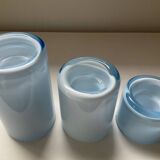 Trio of vintage candlesticks in double-layer glass paste