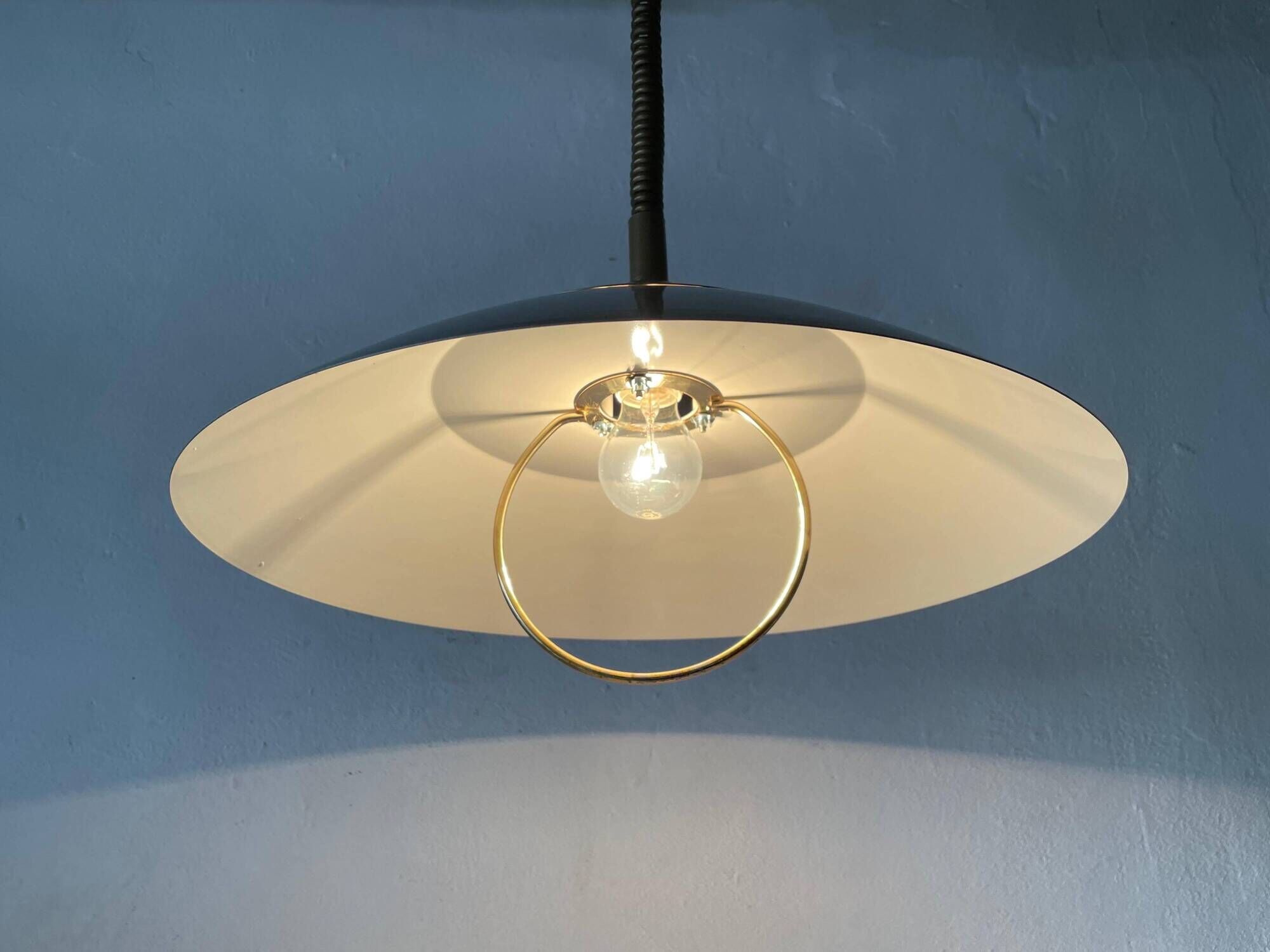 Suspended lamp in chrome and gold metal by TZ, 1970s, Germany.