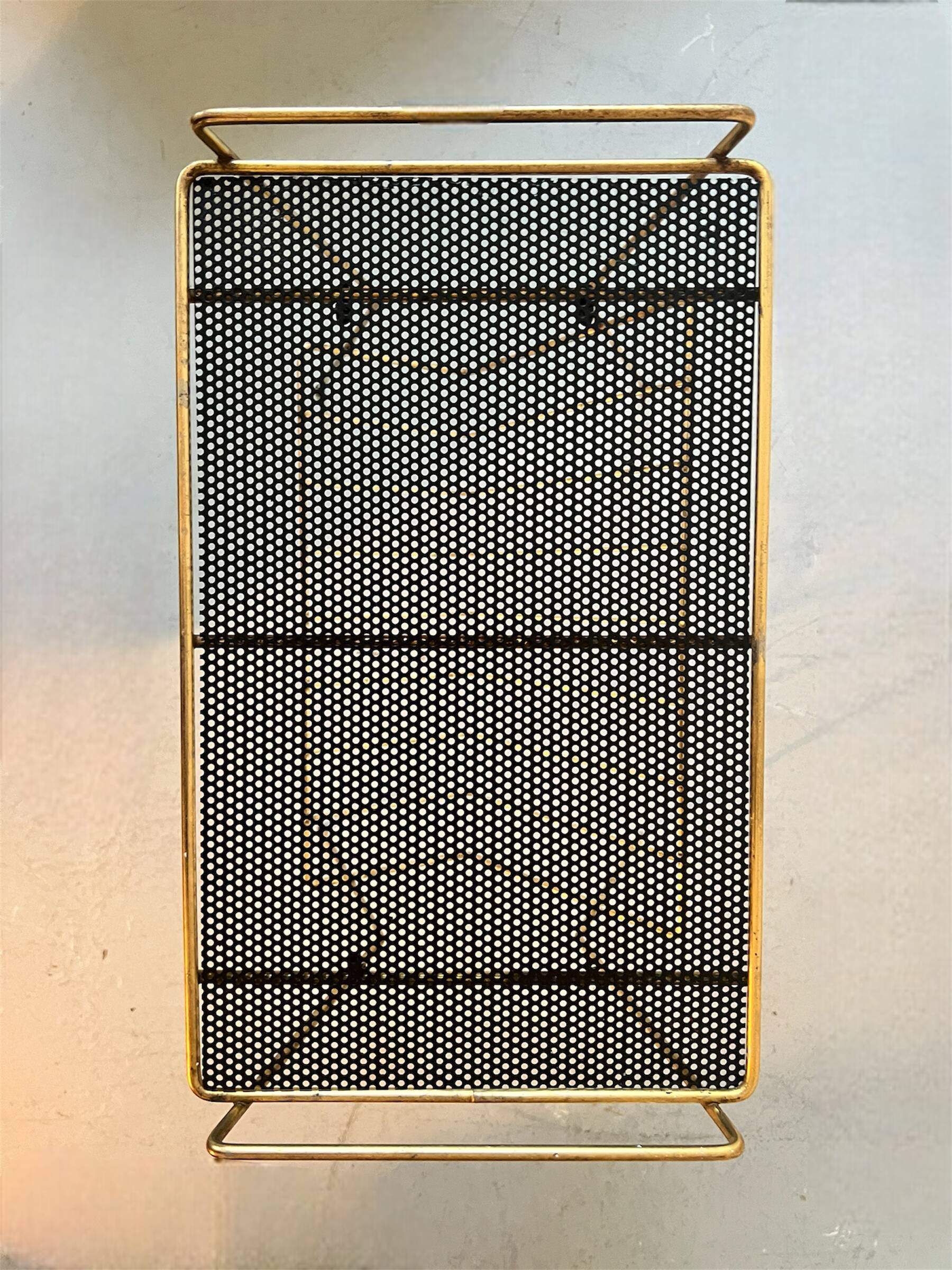 Side table - perforated metal magazine rack, designed by Matégot