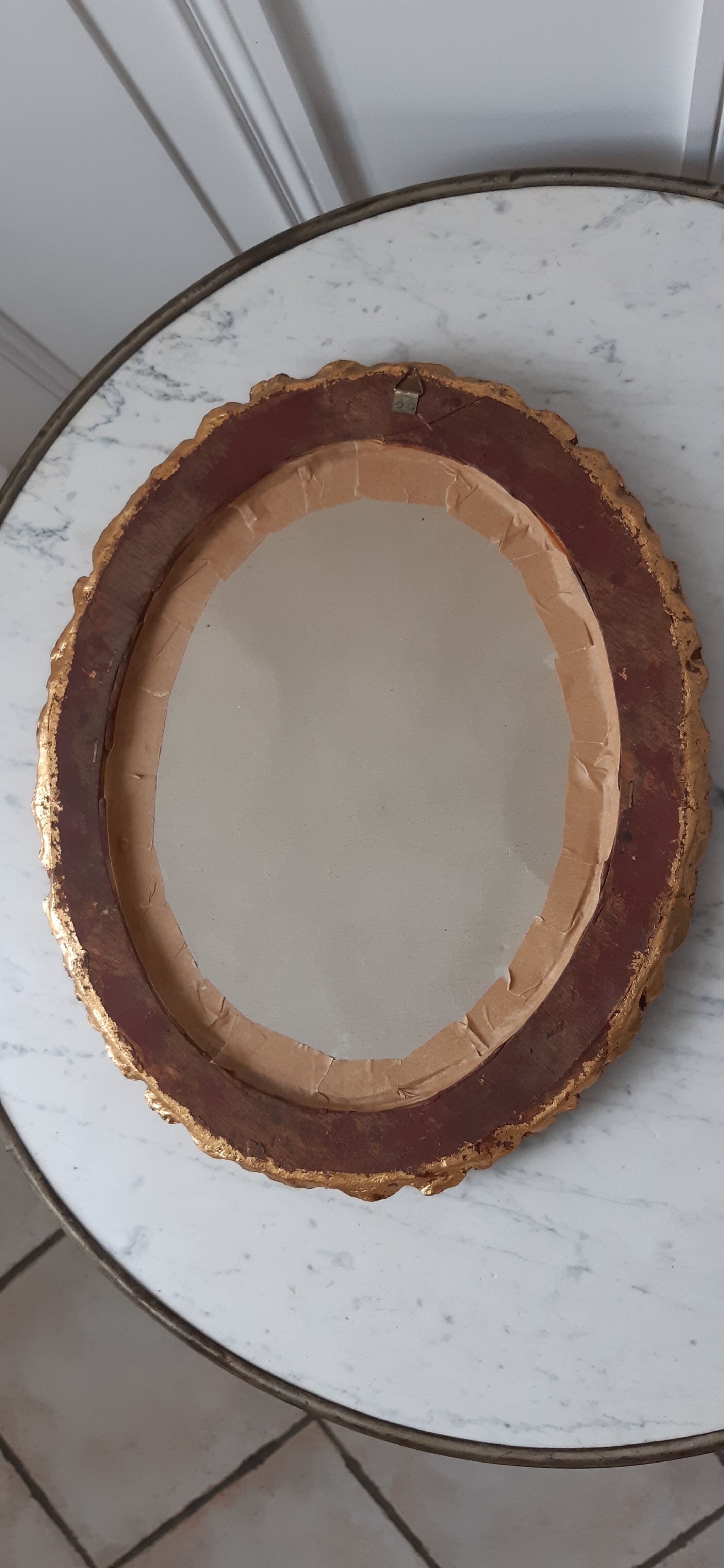 Old mirror in gilded wood late nineteenth