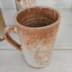 Set of 5 vintage handcrafted stoneware mugs in beige, pink, and white glazed stoneware