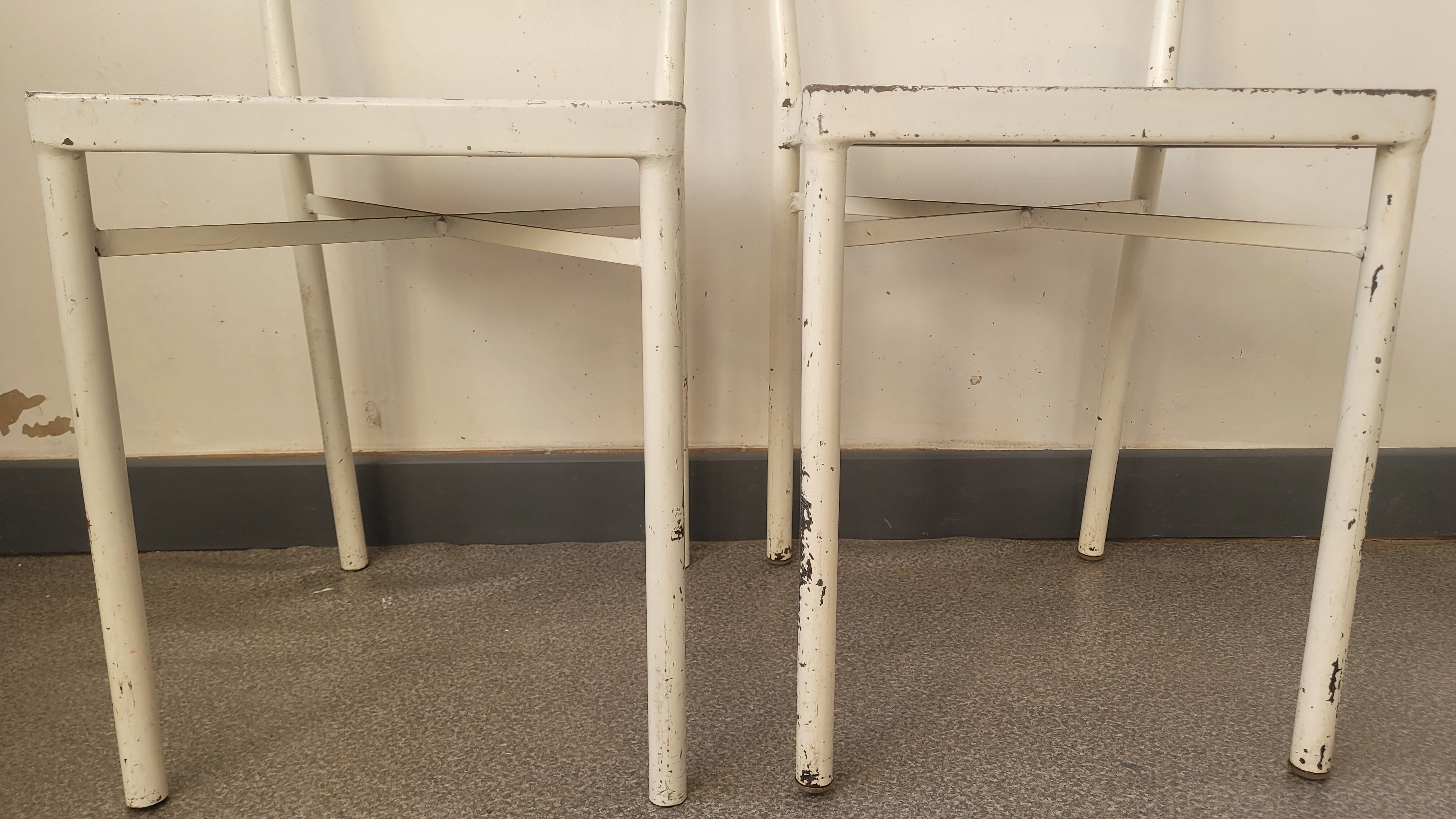 Pair of patinated white metal chairs