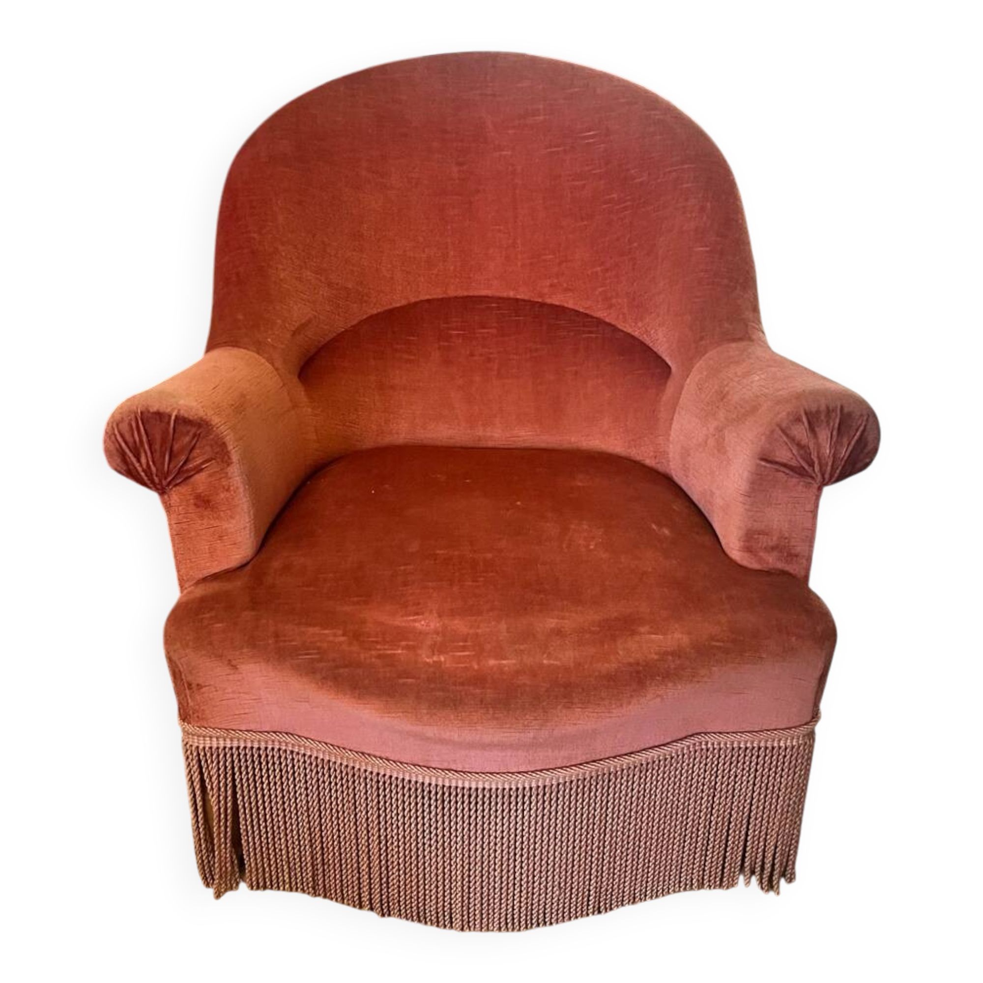 Old pink velvet armchair