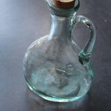 Bouteille ancienne en verre soufflé