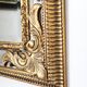 Grand miroir italien doré en bois à verre biseauté