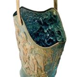 Antique red copper umbrella stand decorated with putti angels.