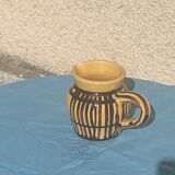 Vintage prince henry enamelled ceramic pitcher
