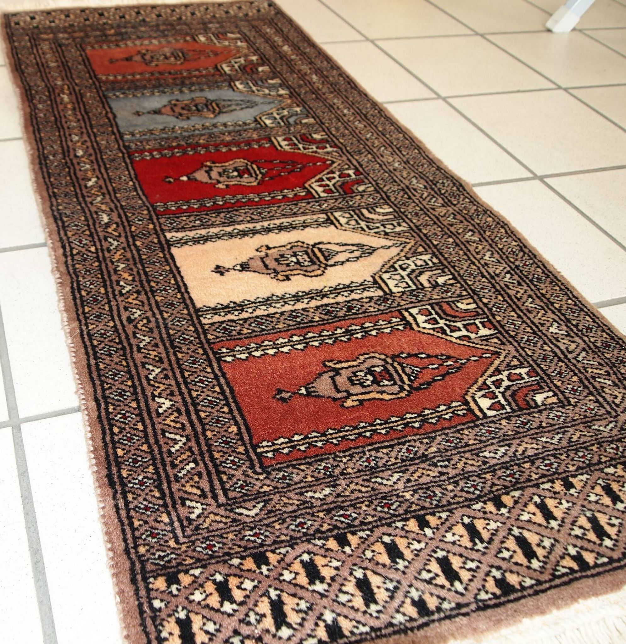 Tapis vintage fait main Bukhara de prière en laine rouge (45cm x 101cm)