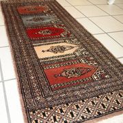Tapis vintage fait main Bukhara de prière en laine rouge (45cm x 101cm)