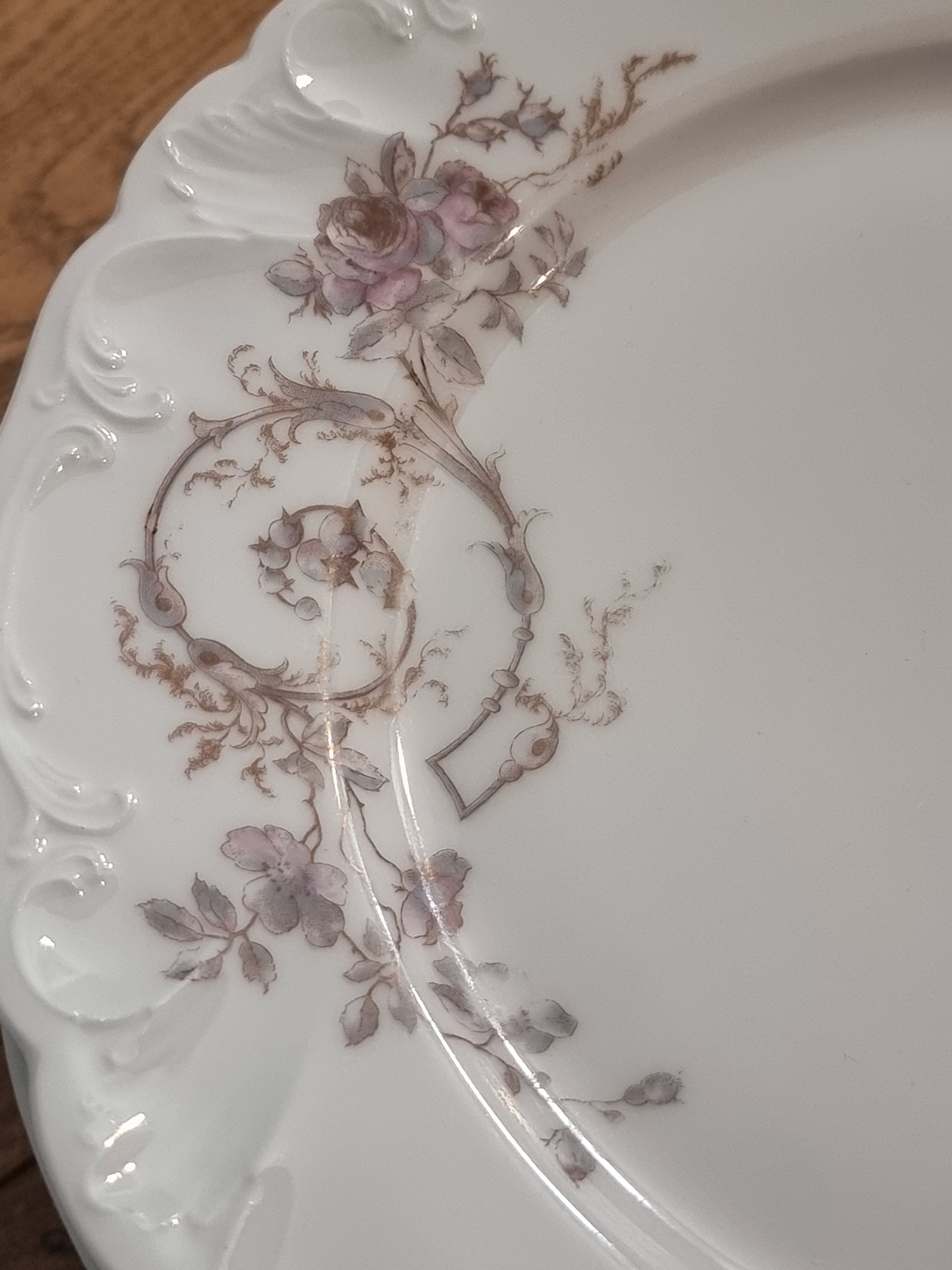 Set of eight Limoges porcelain plates