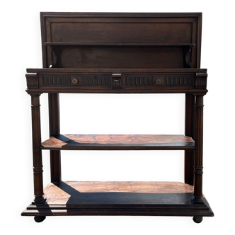 Carved wooden console table with three shelves and drop-leaf flap