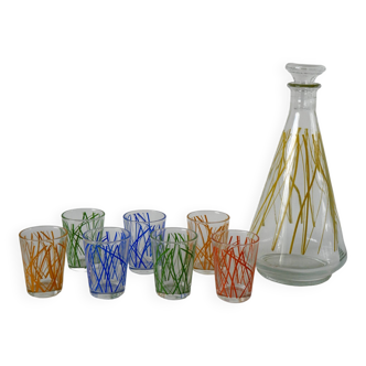 Colorful designer set composed of 7 liqueur glasses and a seventies 70s carafe