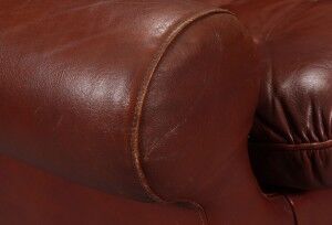 Pair of dark caramel leather armchairs