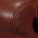 Paire de fauteuils en cuir caramel foncé