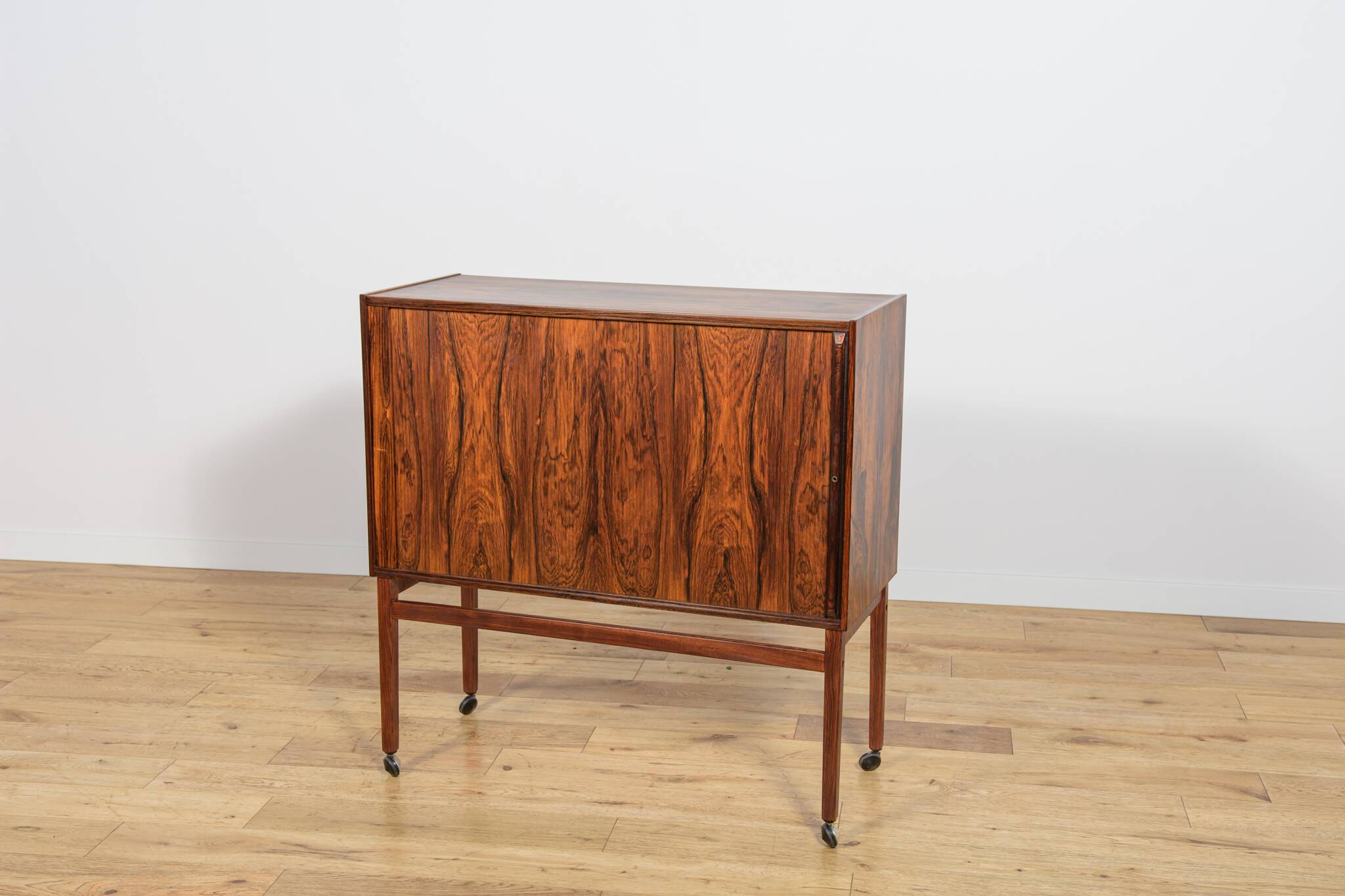 Mid-century rosewood bar with roller doors, Denmark, 1960s