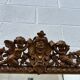 19th-century mirror with cherubs