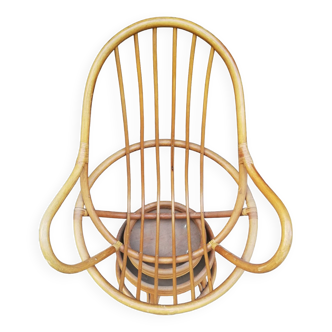 Vintage rattan swivel armchair