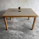 Magnus Olesen Danish dining table — light oak frame with recessed grey laminated top, 1970s