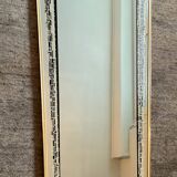 Asymmetrical free-form mirror from the 1970s