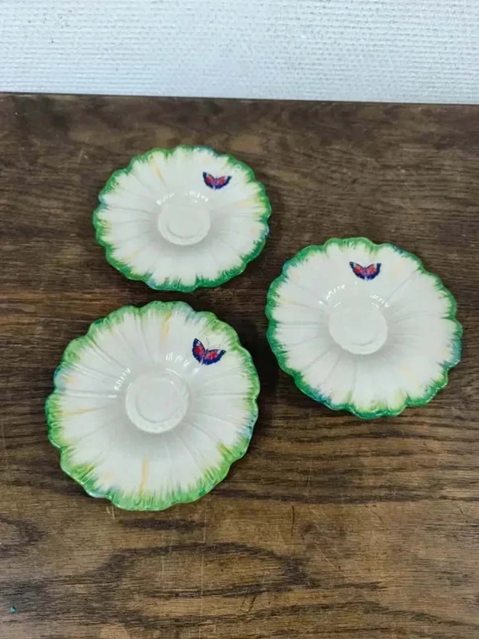 Set of 3 antique Lunéville butterfly saucers / saucers in barbotine.