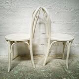 Pair of white Baumann bistro chairs